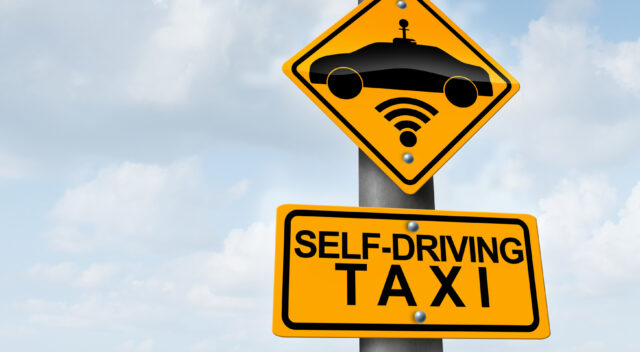 Skylt för självkörande taxi. Bild: Mostphotos.