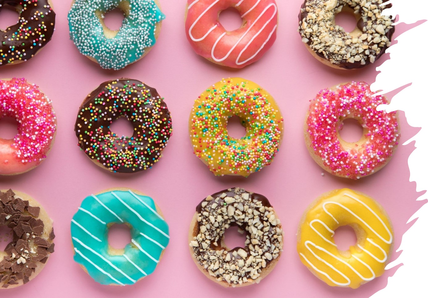 Bild på doughnuts i olika färger.